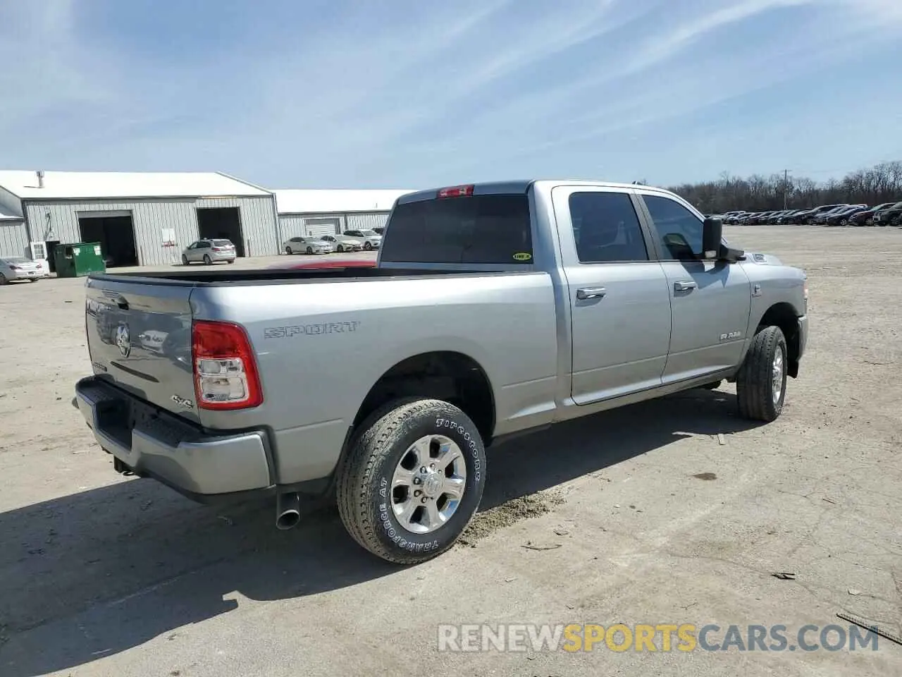 3 Photograph of a damaged car 3C6UR5DL5NG147112 RAM 2500 2022