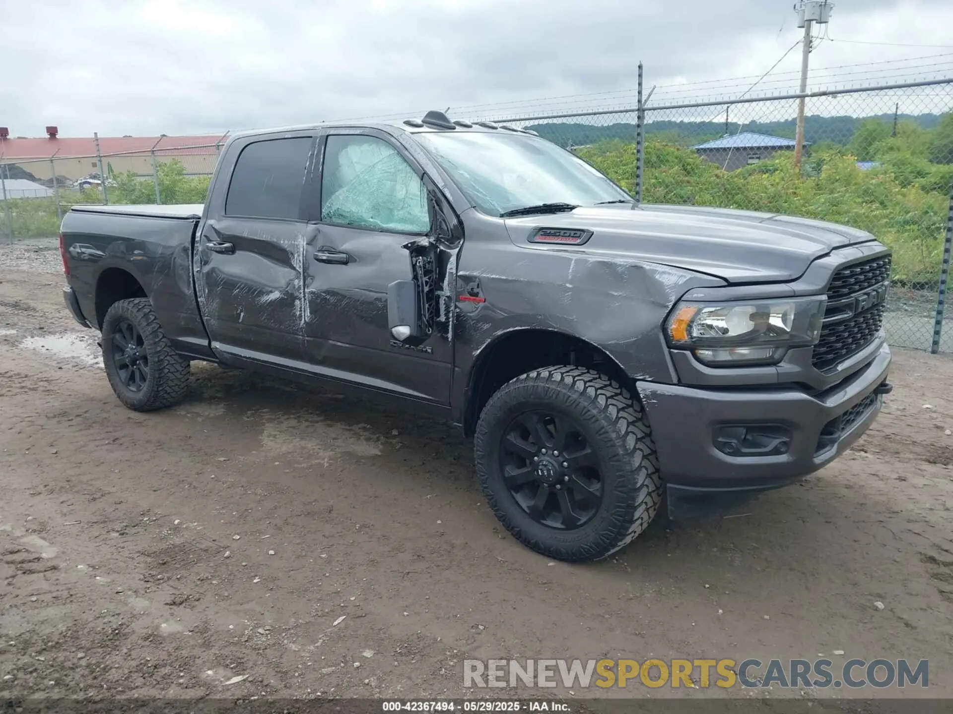 1 Photograph of a damaged car 3C6UR5DL5NG209298 RAM 2500 2022