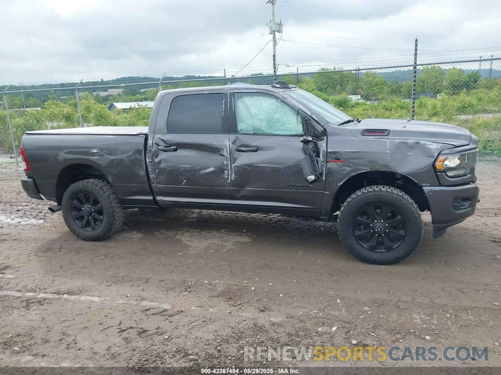 13 Photograph of a damaged car 3C6UR5DL5NG209298 RAM 2500 2022