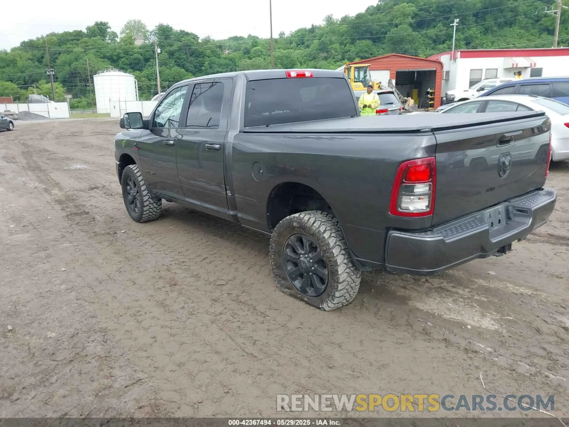 3 Photograph of a damaged car 3C6UR5DL5NG209298 RAM 2500 2022