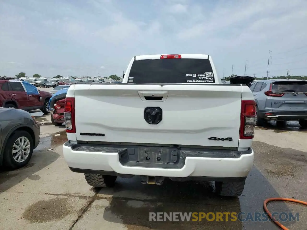 6 Photograph of a damaged car 3C6UR5DL5NG394811 RAM 2500 2022