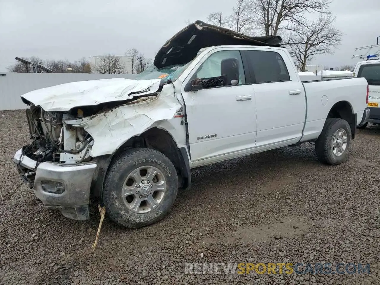 1 Photograph of a damaged car 3C6UR5DL5NG410375 RAM 2500 2022