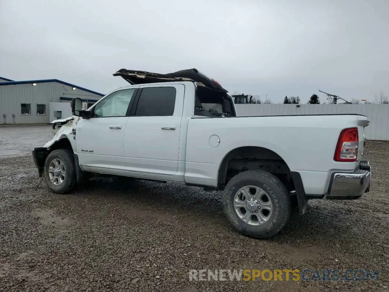 2 Photograph of a damaged car 3C6UR5DL5NG410375 RAM 2500 2022