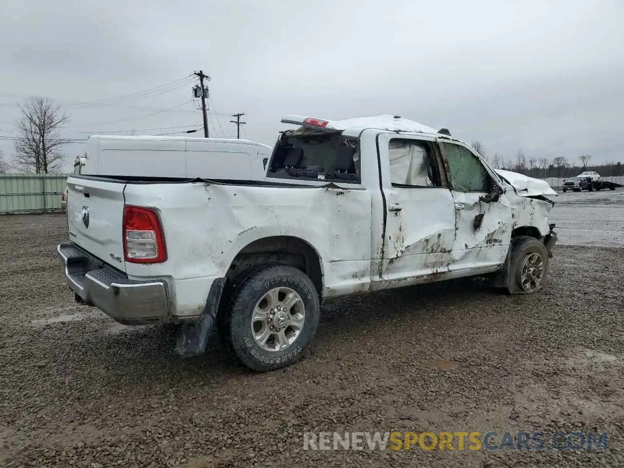 3 Photograph of a damaged car 3C6UR5DL5NG410375 RAM 2500 2022