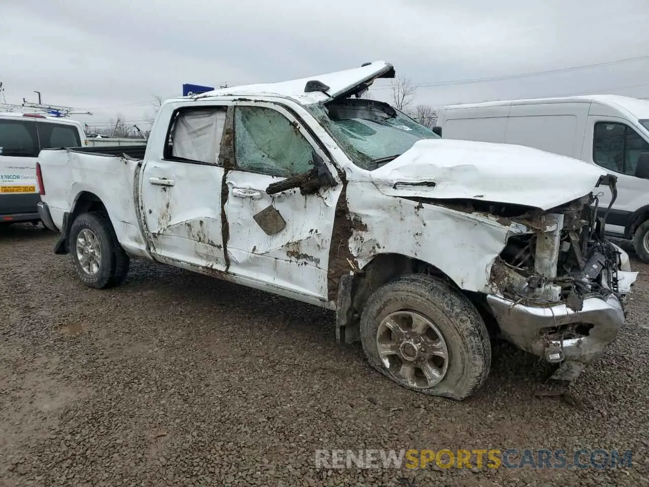 4 Photograph of a damaged car 3C6UR5DL5NG410375 RAM 2500 2022