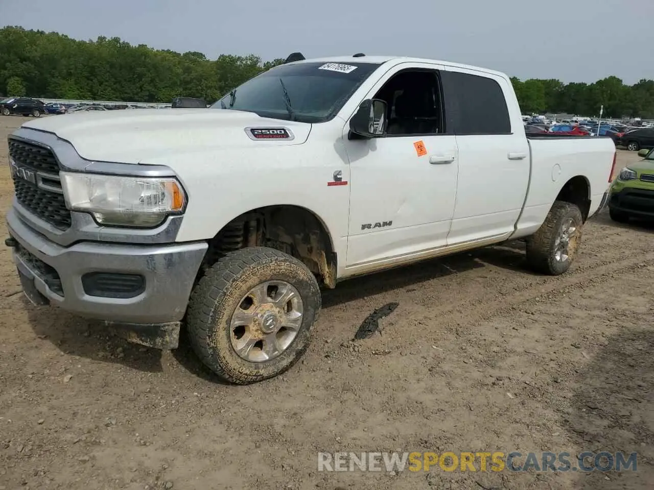1 Photograph of a damaged car 3C6UR5DL6NG254878 RAM 2500 2022