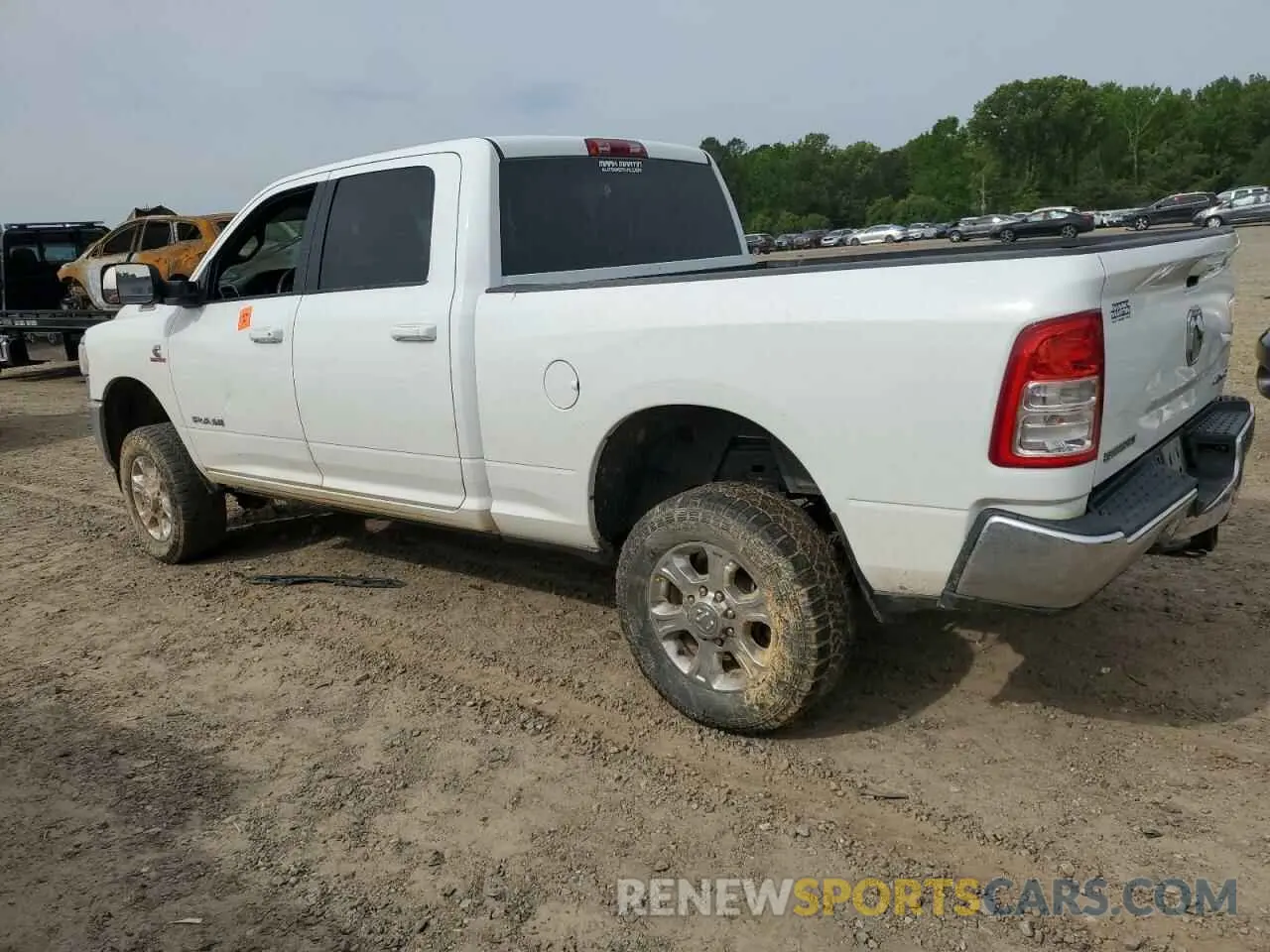 2 Photograph of a damaged car 3C6UR5DL6NG254878 RAM 2500 2022