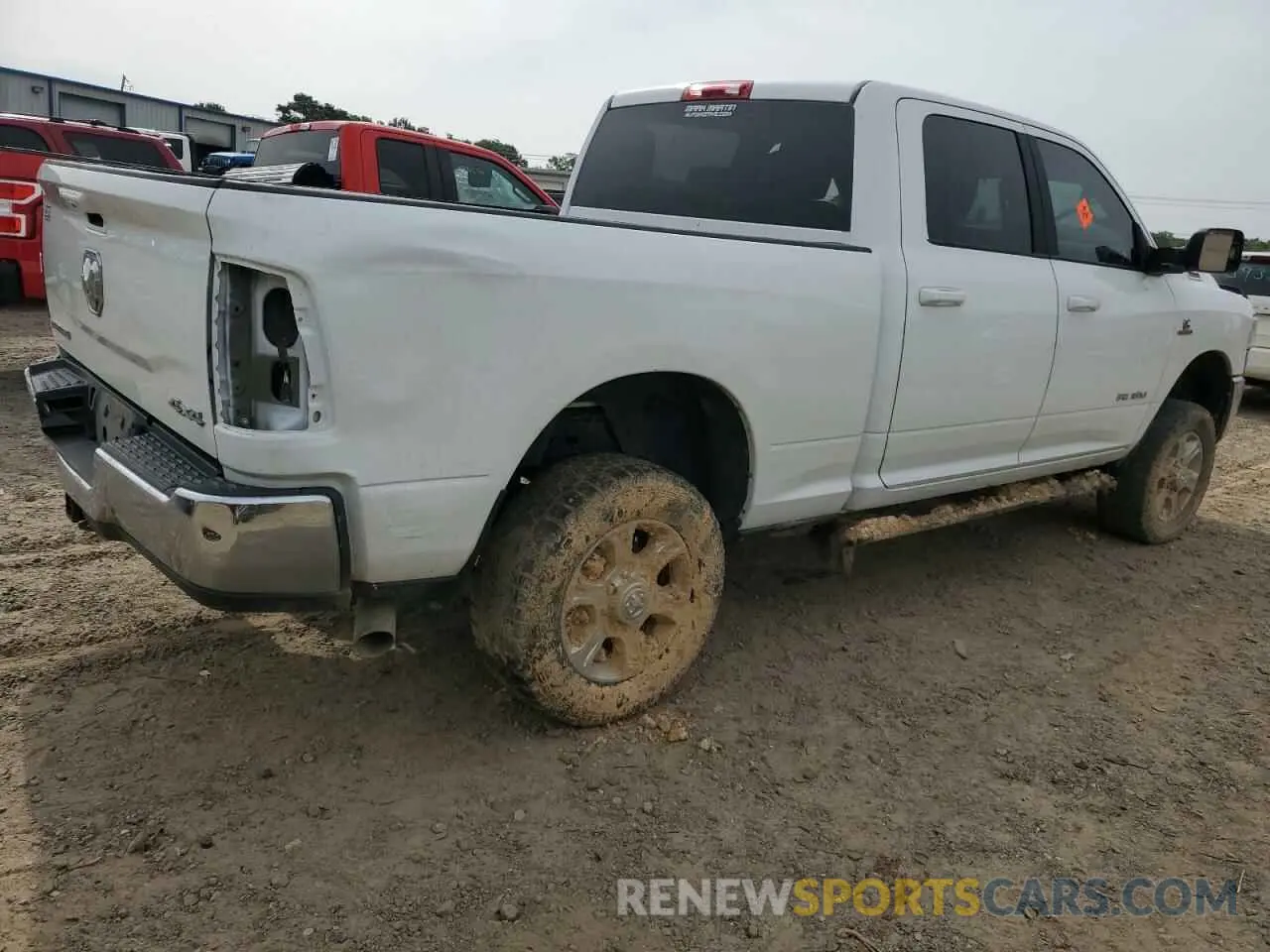 3 Photograph of a damaged car 3C6UR5DL6NG254878 RAM 2500 2022
