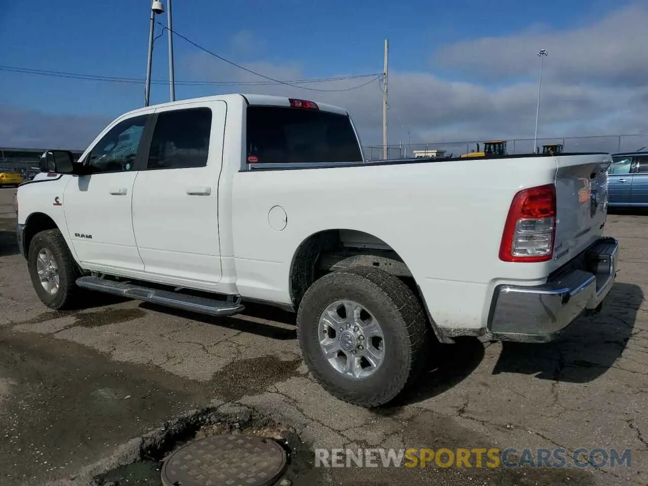 2 Photograph of a damaged car 3C6UR5DL6NG322208 RAM 2500 2022