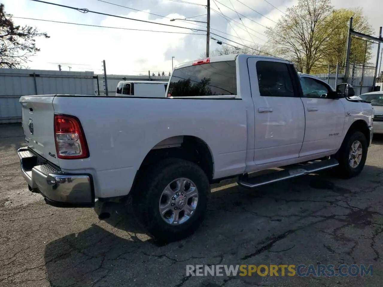 3 Photograph of a damaged car 3C6UR5DL6NG322208 RAM 2500 2022