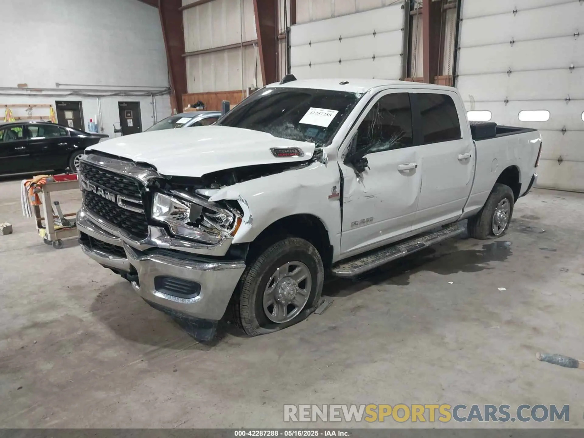 2 Photograph of a damaged car 3C6UR5DL6NG436791 RAM 2500 2022
