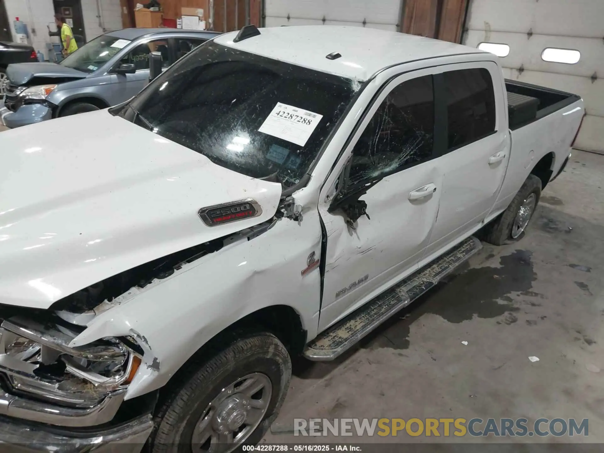 6 Photograph of a damaged car 3C6UR5DL6NG436791 RAM 2500 2022