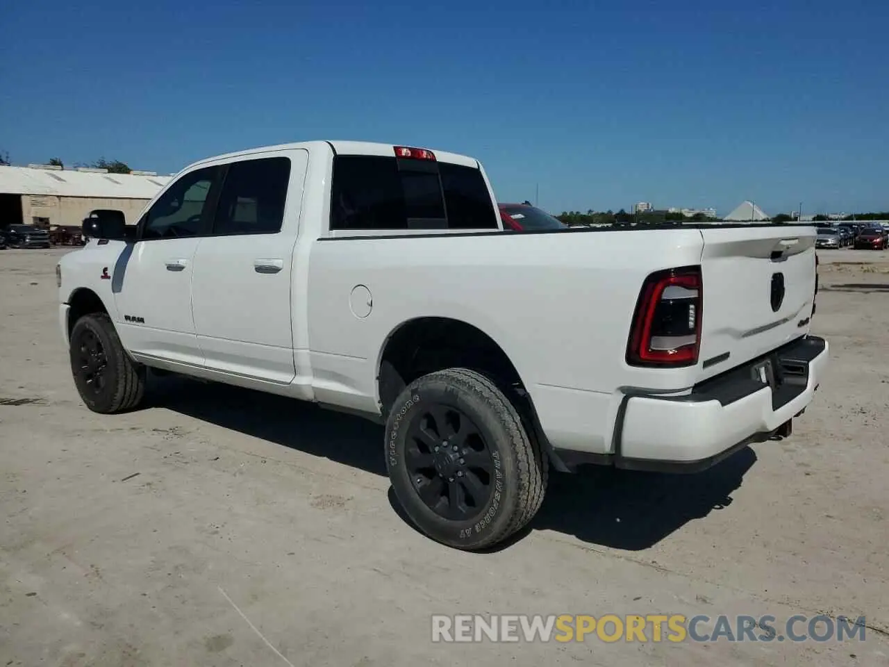2 Photograph of a damaged car 3C6UR5DL7NG109526 RAM 2500 2022