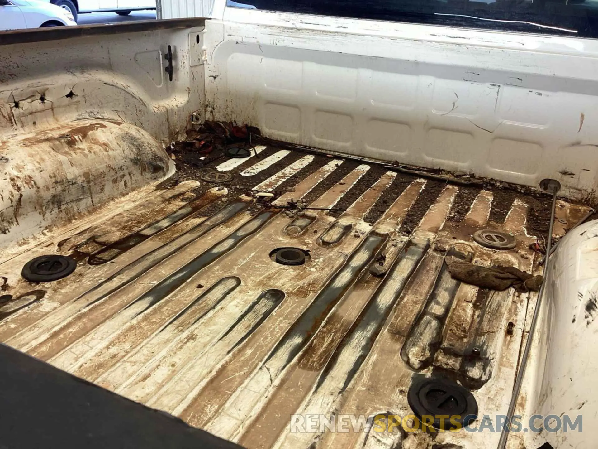 19 Photograph of a damaged car 3C6UR5DL8NG220859 RAM 2500 2022