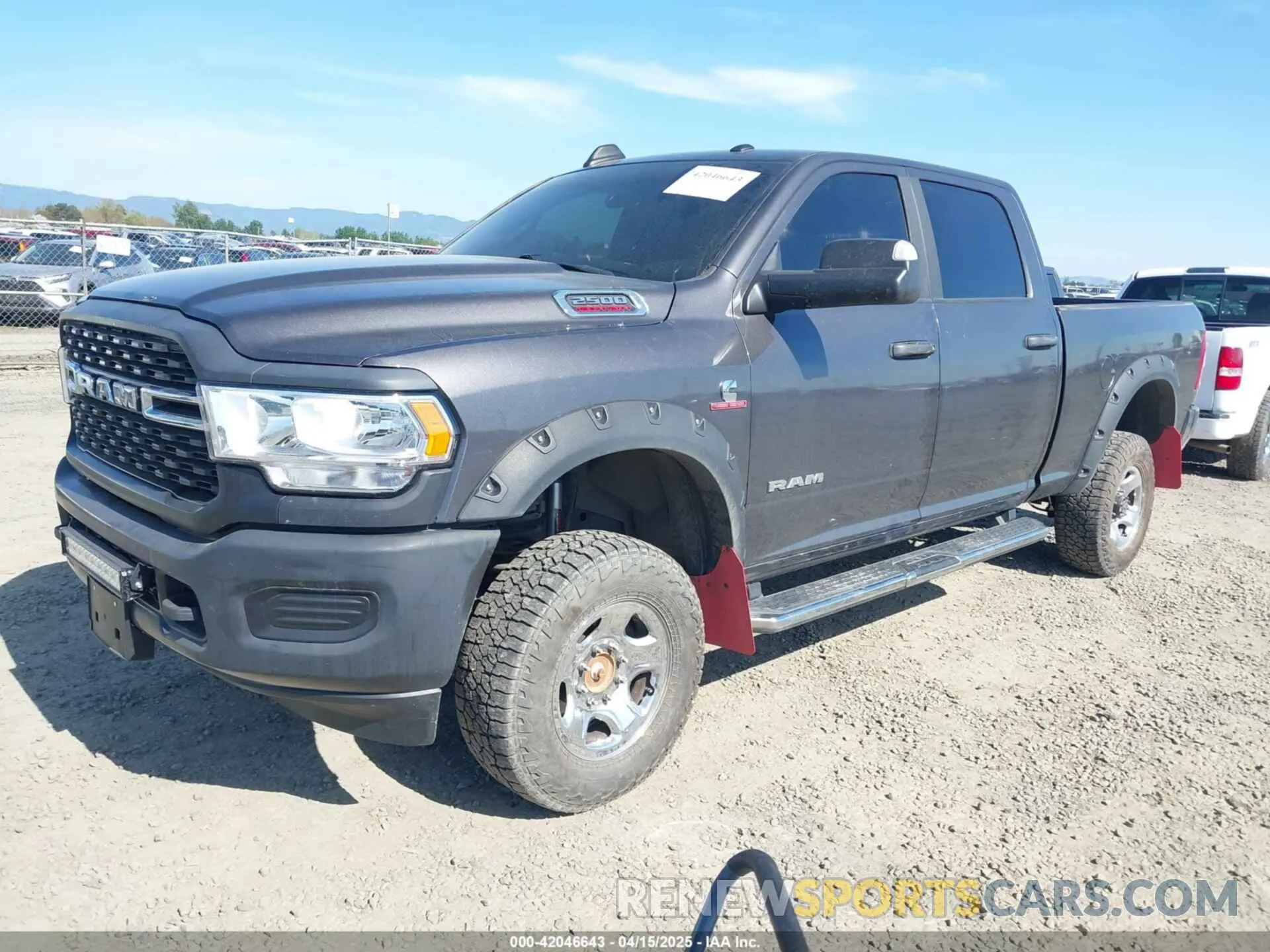 2 Photograph of a damaged car 3C6UR5DL8NG324154 RAM 2500 2022