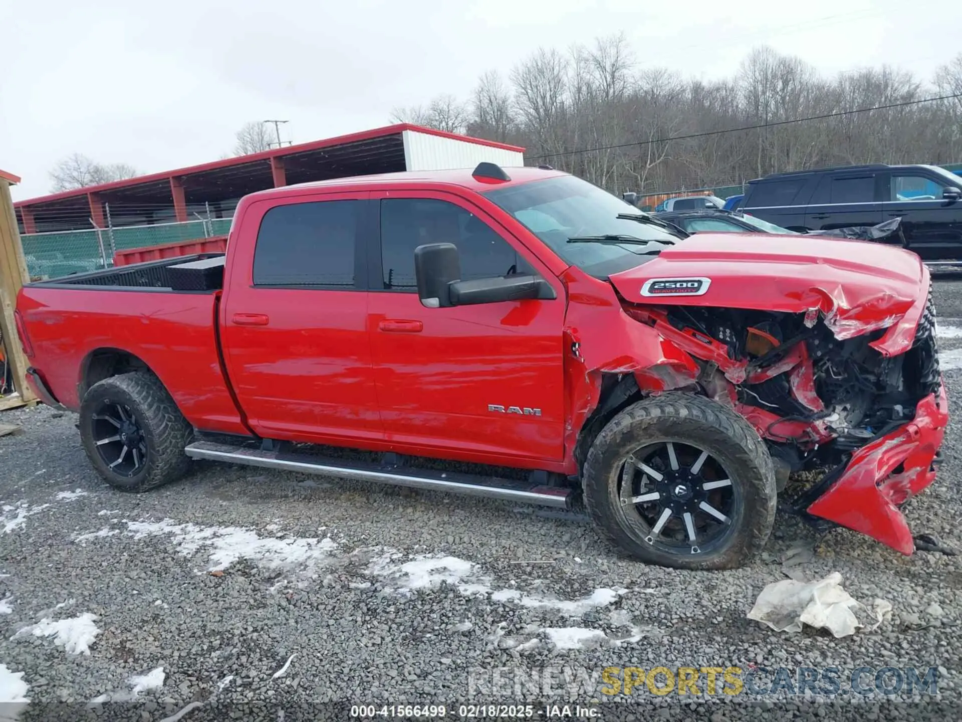 13 Photograph of a damaged car 3C6UR5DL9NG129695 RAM 2500 2022