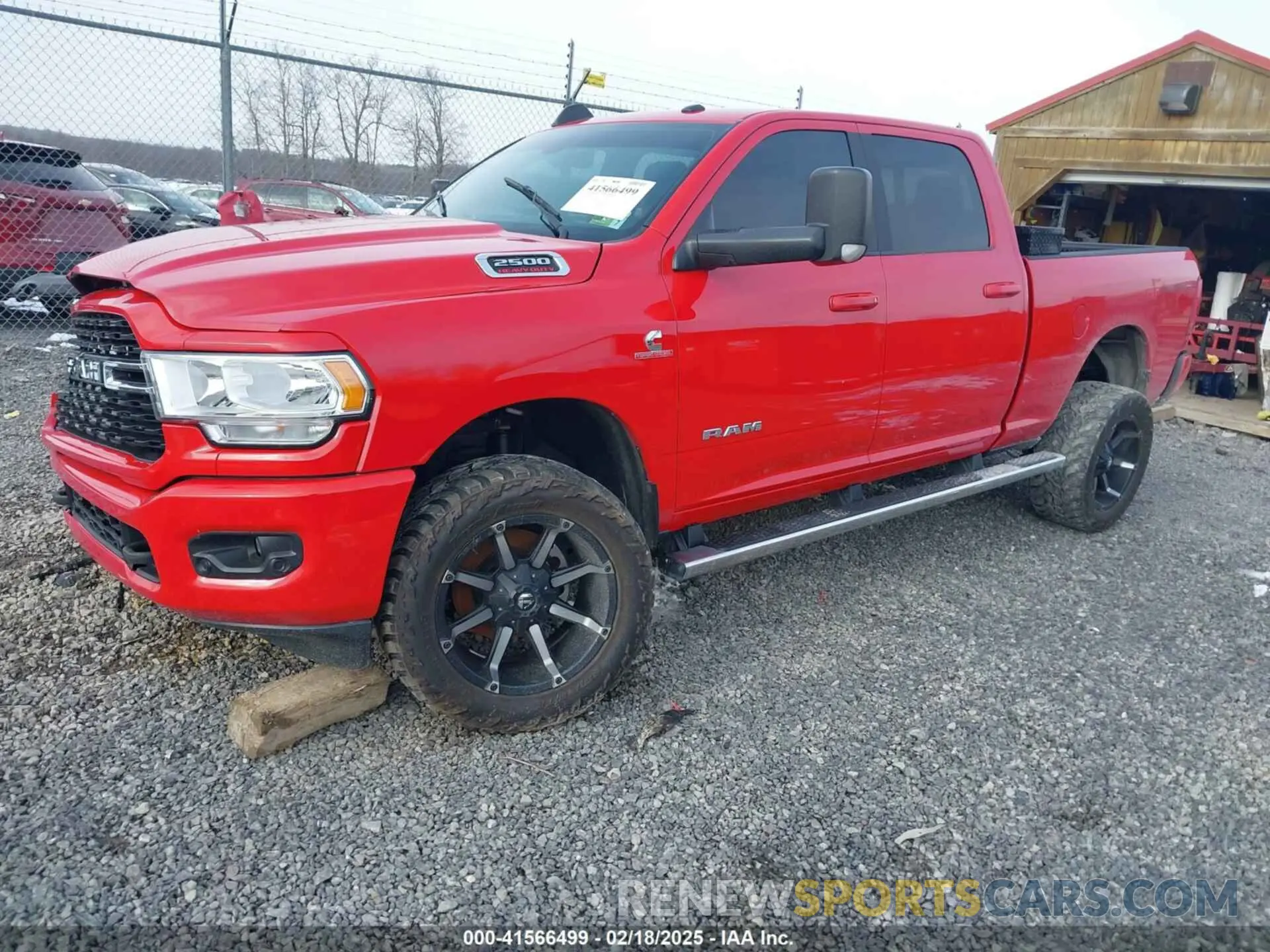 2 Photograph of a damaged car 3C6UR5DL9NG129695 RAM 2500 2022