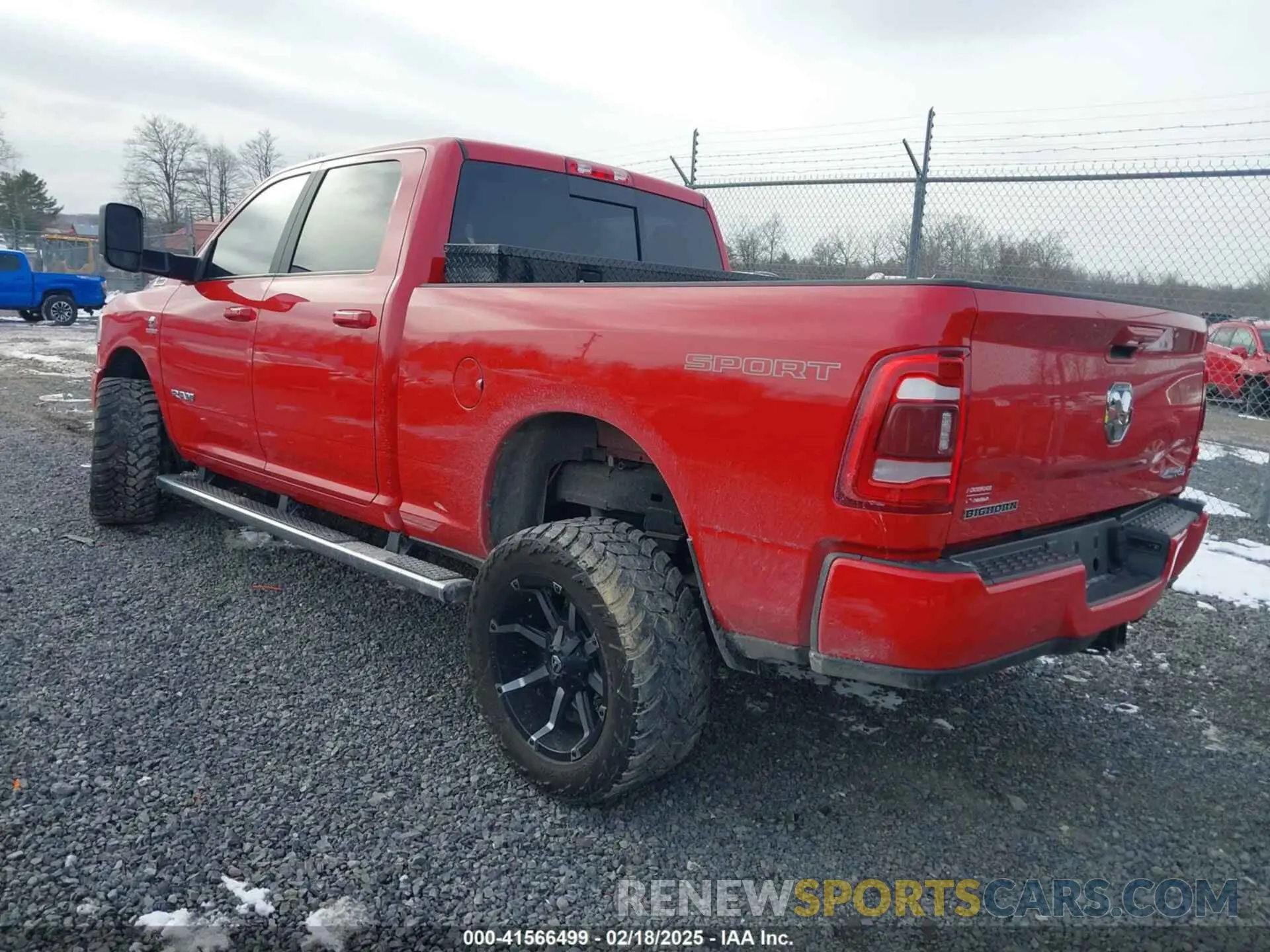 3 Photograph of a damaged car 3C6UR5DL9NG129695 RAM 2500 2022