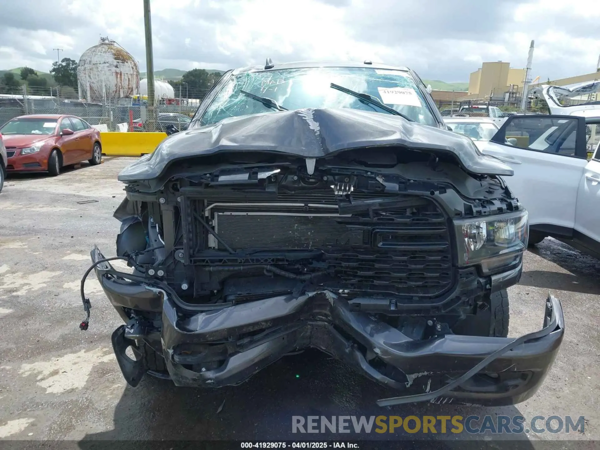 11 Photograph of a damaged car 3C6UR5DL9NG143032 RAM 2500 2022