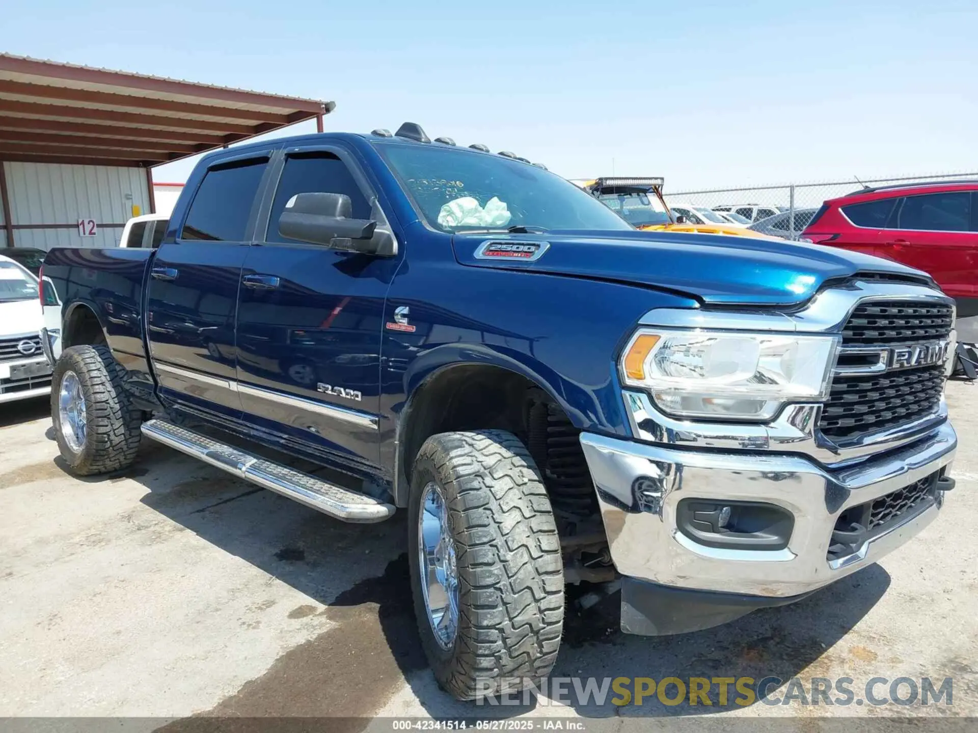 13 Photograph of a damaged car 3C6UR5DL9NG149414 RAM 2500 2022