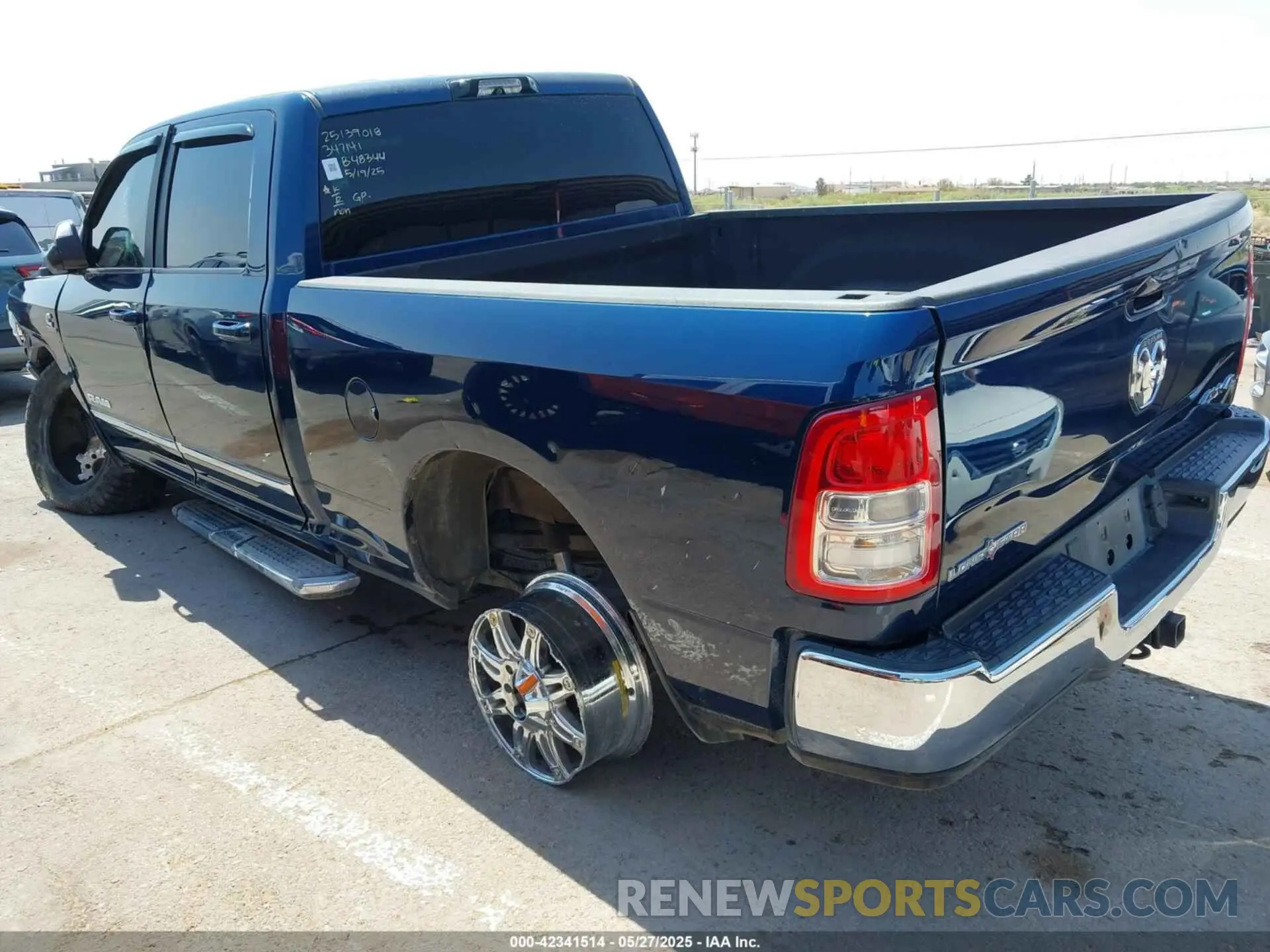 3 Photograph of a damaged car 3C6UR5DL9NG149414 RAM 2500 2022