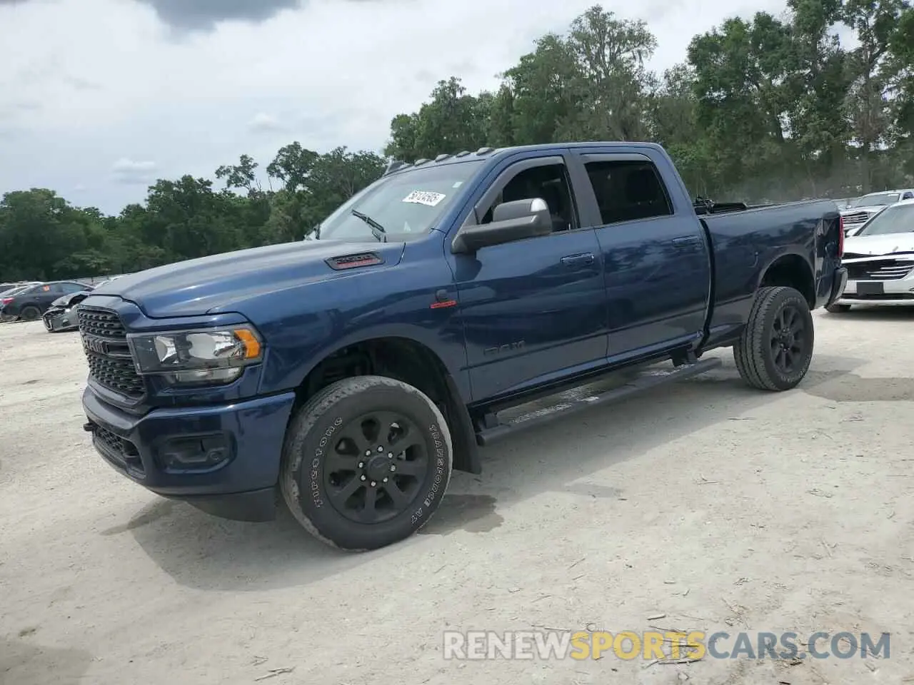 1 Photograph of a damaged car 3C6UR5DL9NG149946 RAM 2500 2022