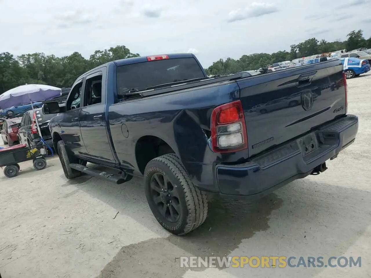 2 Photograph of a damaged car 3C6UR5DL9NG149946 RAM 2500 2022