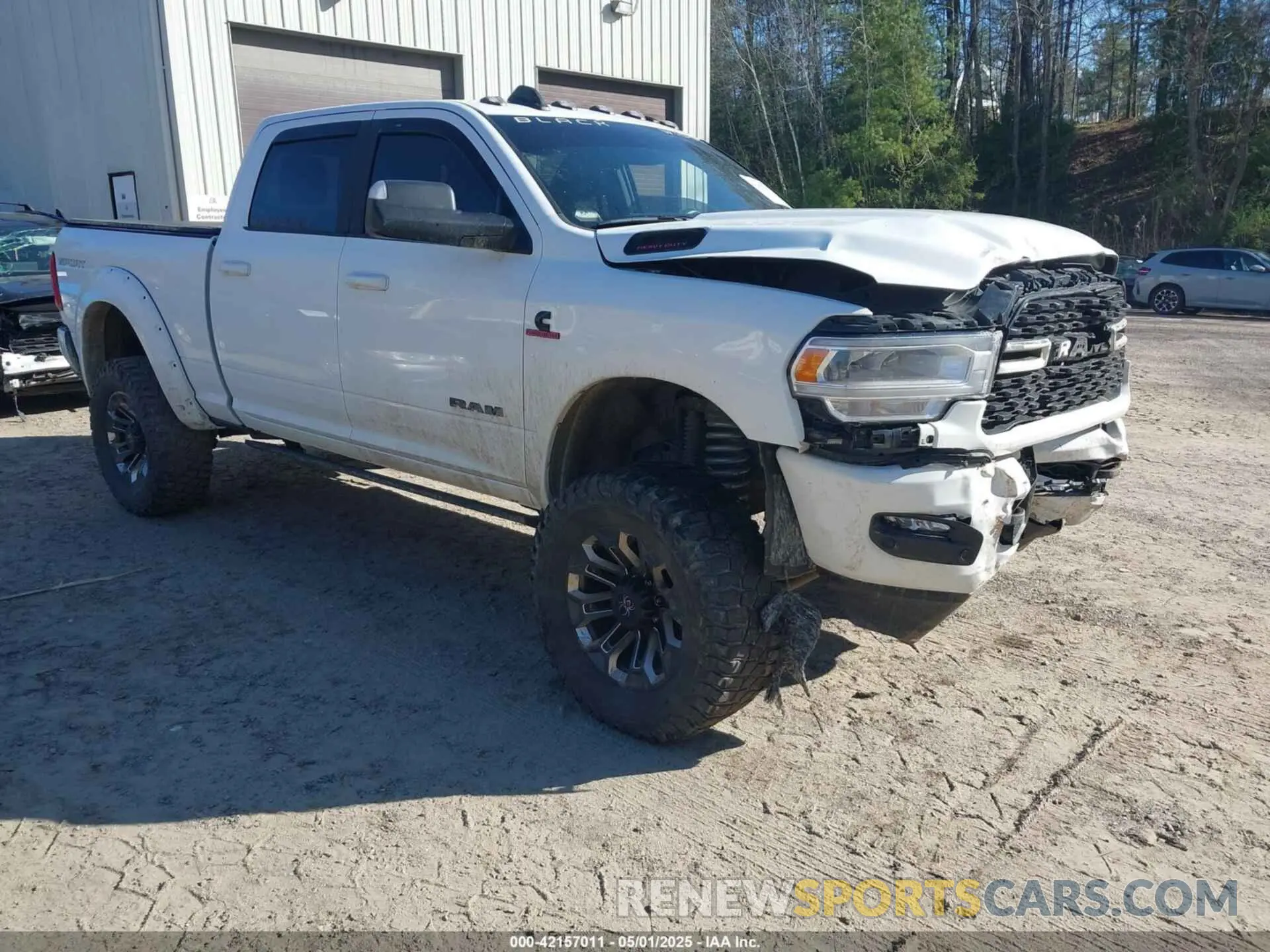 1 Photograph of a damaged car 3C6UR5DL9NG169775 RAM 2500 2022