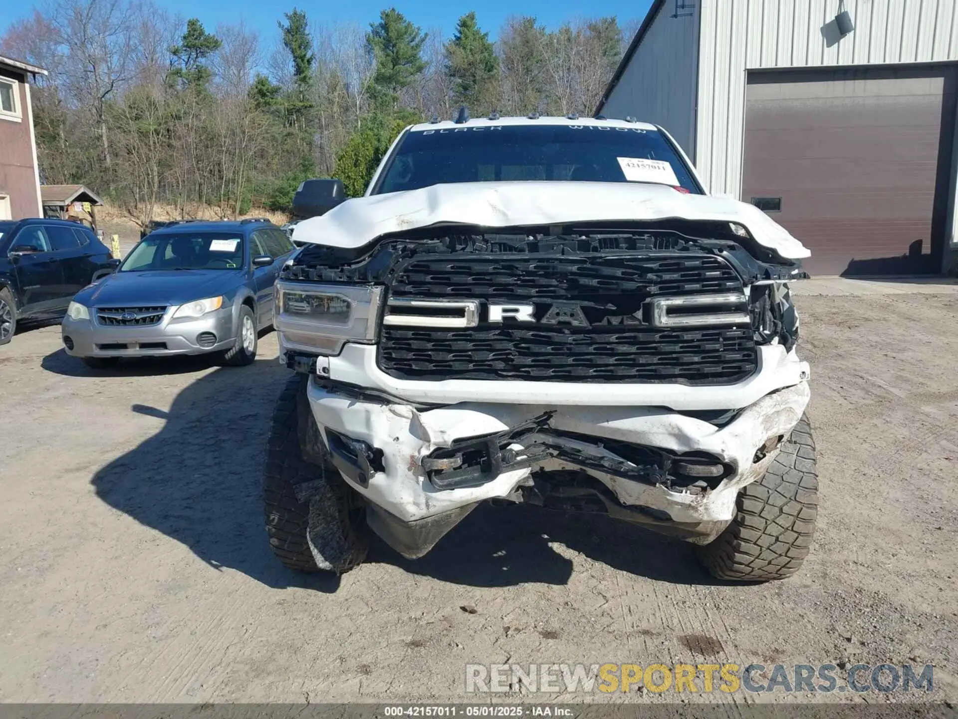 12 Photograph of a damaged car 3C6UR5DL9NG169775 RAM 2500 2022