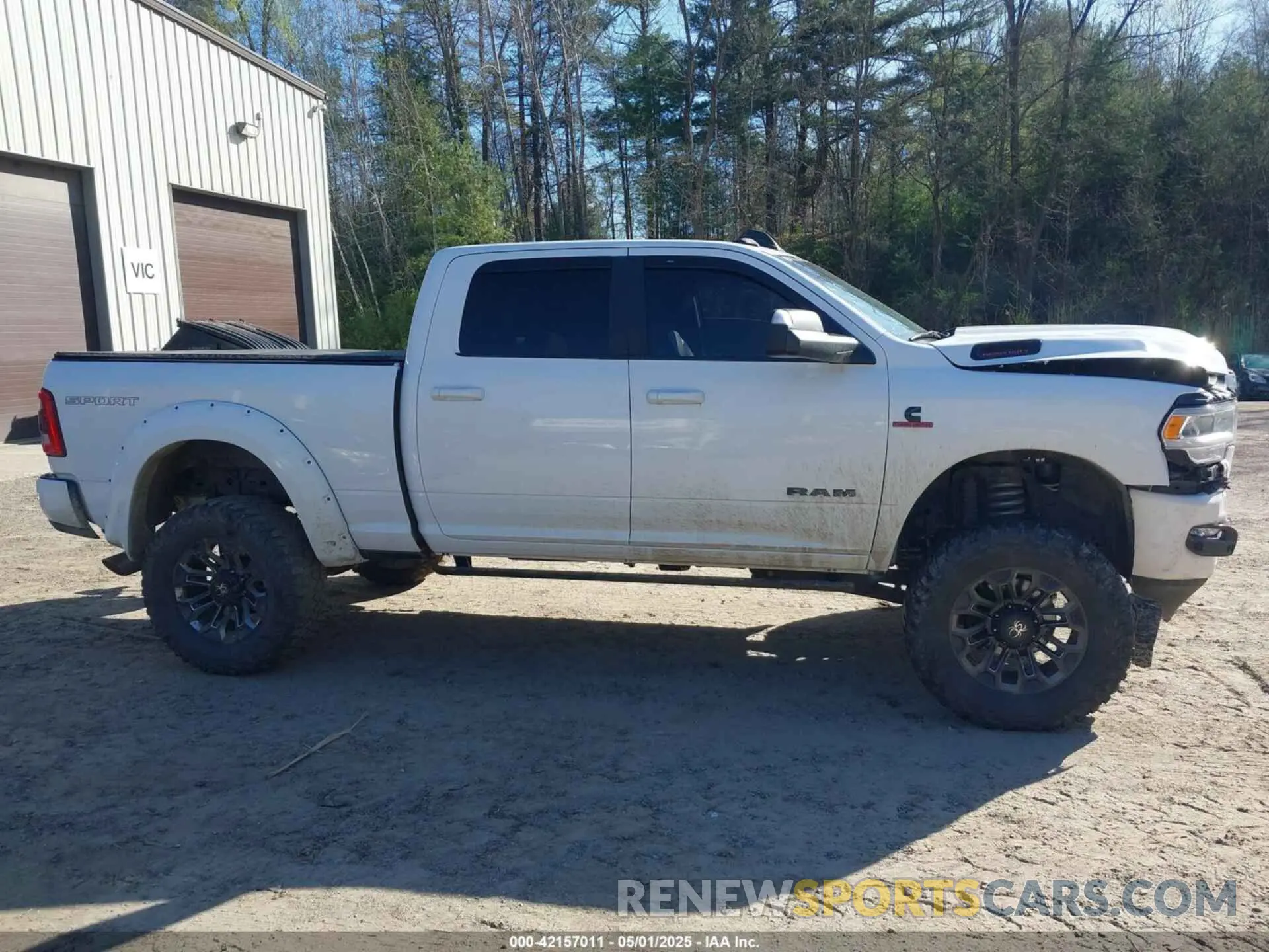 13 Photograph of a damaged car 3C6UR5DL9NG169775 RAM 2500 2022