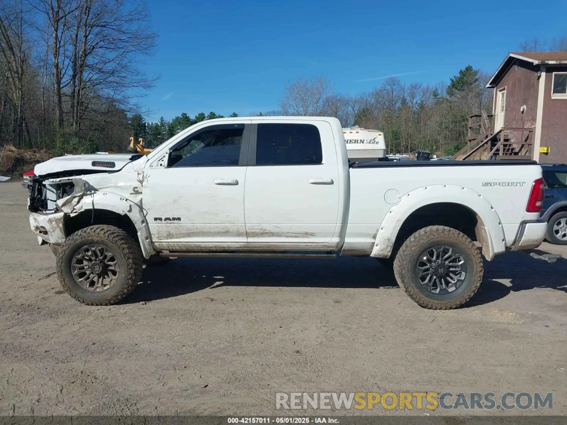 14 Photograph of a damaged car 3C6UR5DL9NG169775 RAM 2500 2022