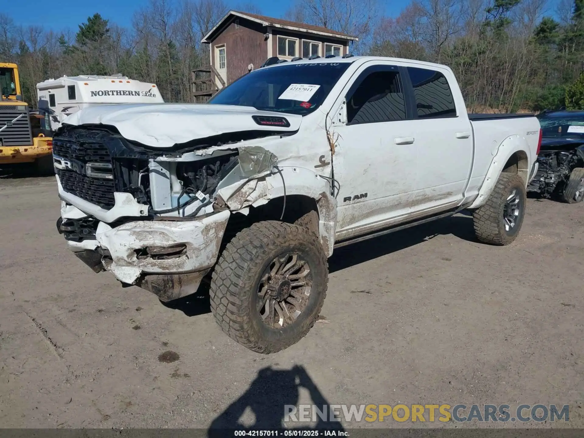 2 Photograph of a damaged car 3C6UR5DL9NG169775 RAM 2500 2022