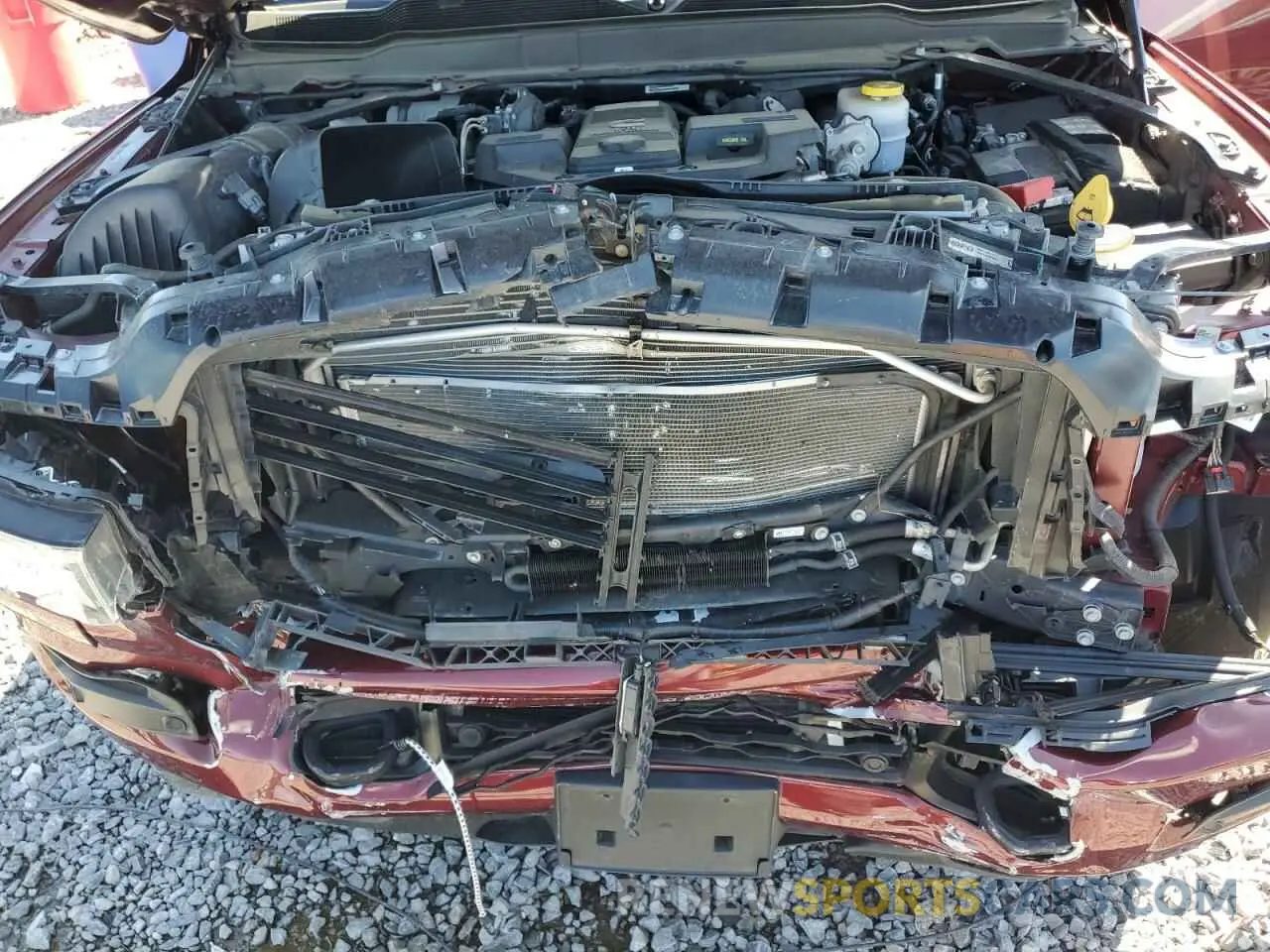11 Photograph of a damaged car 3C6UR5DL9NG185880 RAM 2500 2022
