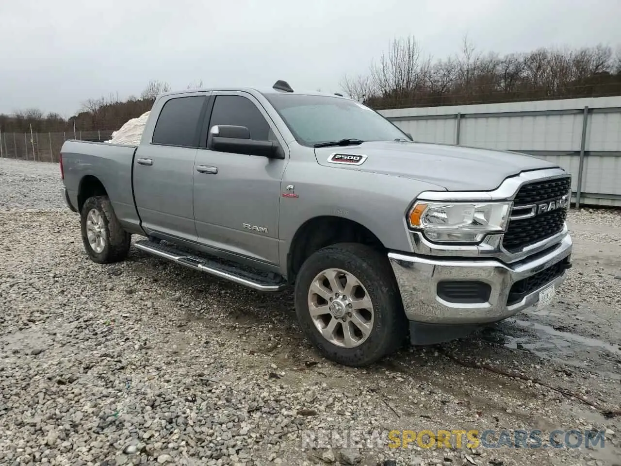 4 Photograph of a damaged car 3C6UR5DLXNG182339 RAM 2500 2022