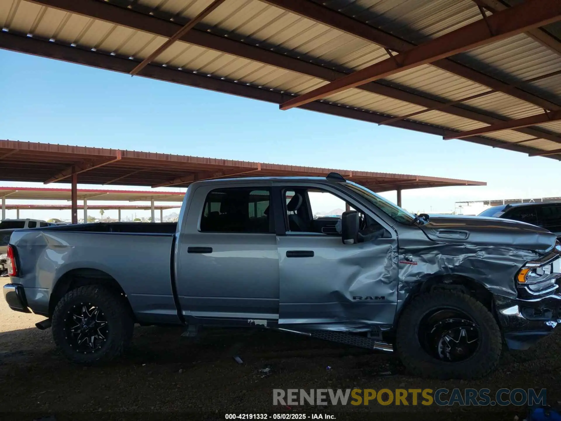 12 Photograph of a damaged car 3C6UR5DLXNG306254 RAM 2500 2022