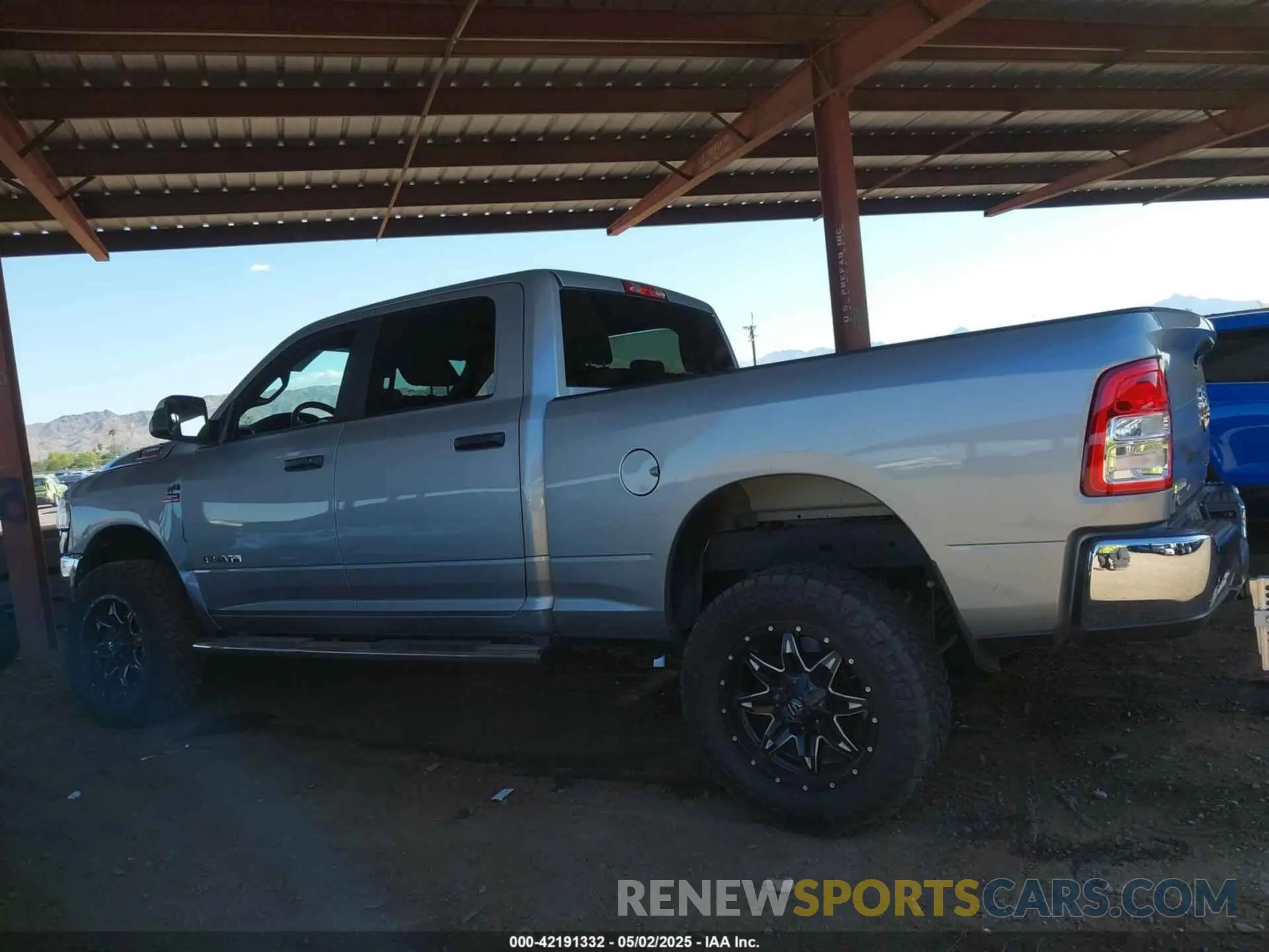 13 Photograph of a damaged car 3C6UR5DLXNG306254 RAM 2500 2022