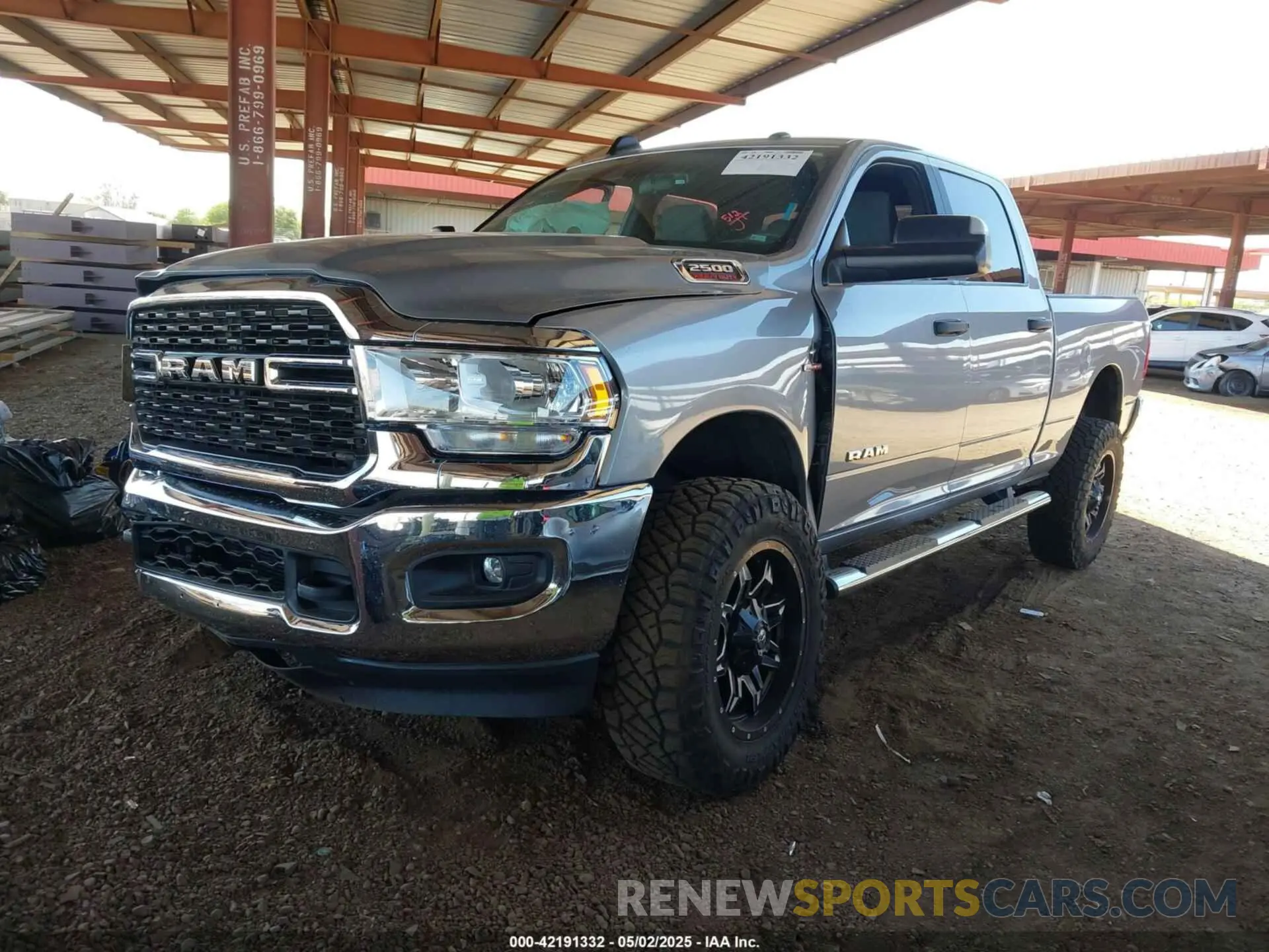 2 Photograph of a damaged car 3C6UR5DLXNG306254 RAM 2500 2022