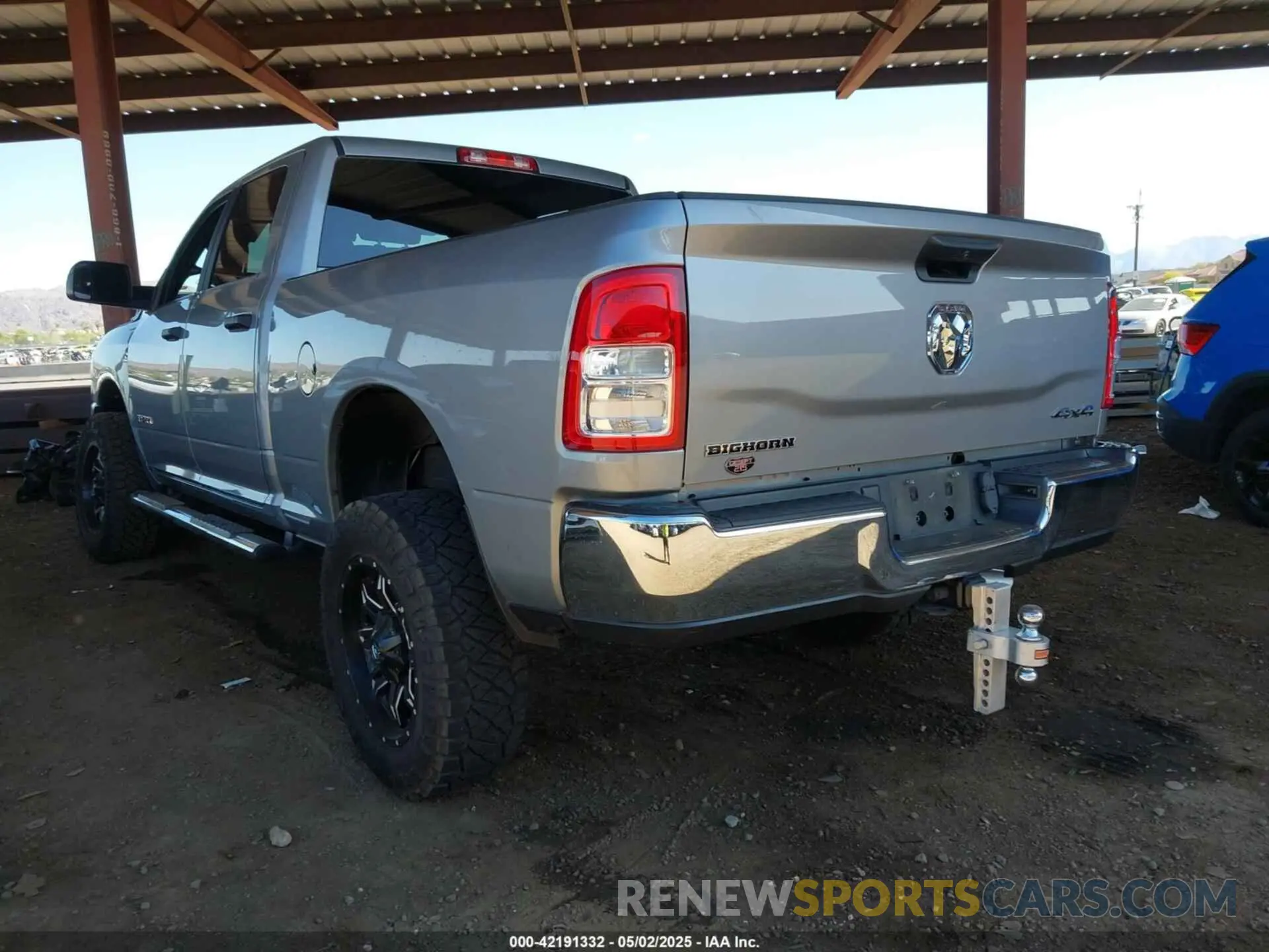 3 Photograph of a damaged car 3C6UR5DLXNG306254 RAM 2500 2022