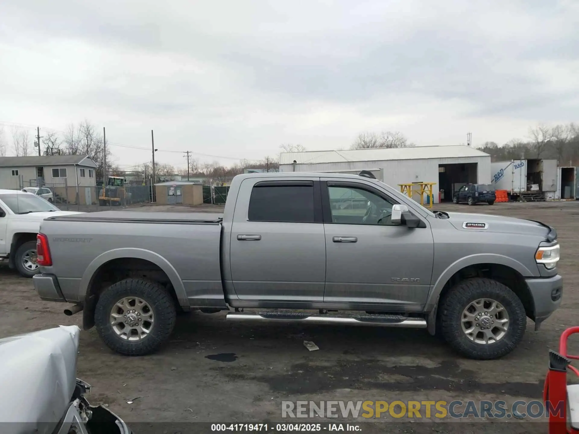 13 Photograph of a damaged car 3C6UR5FJ1NG230435 RAM 2500 2022