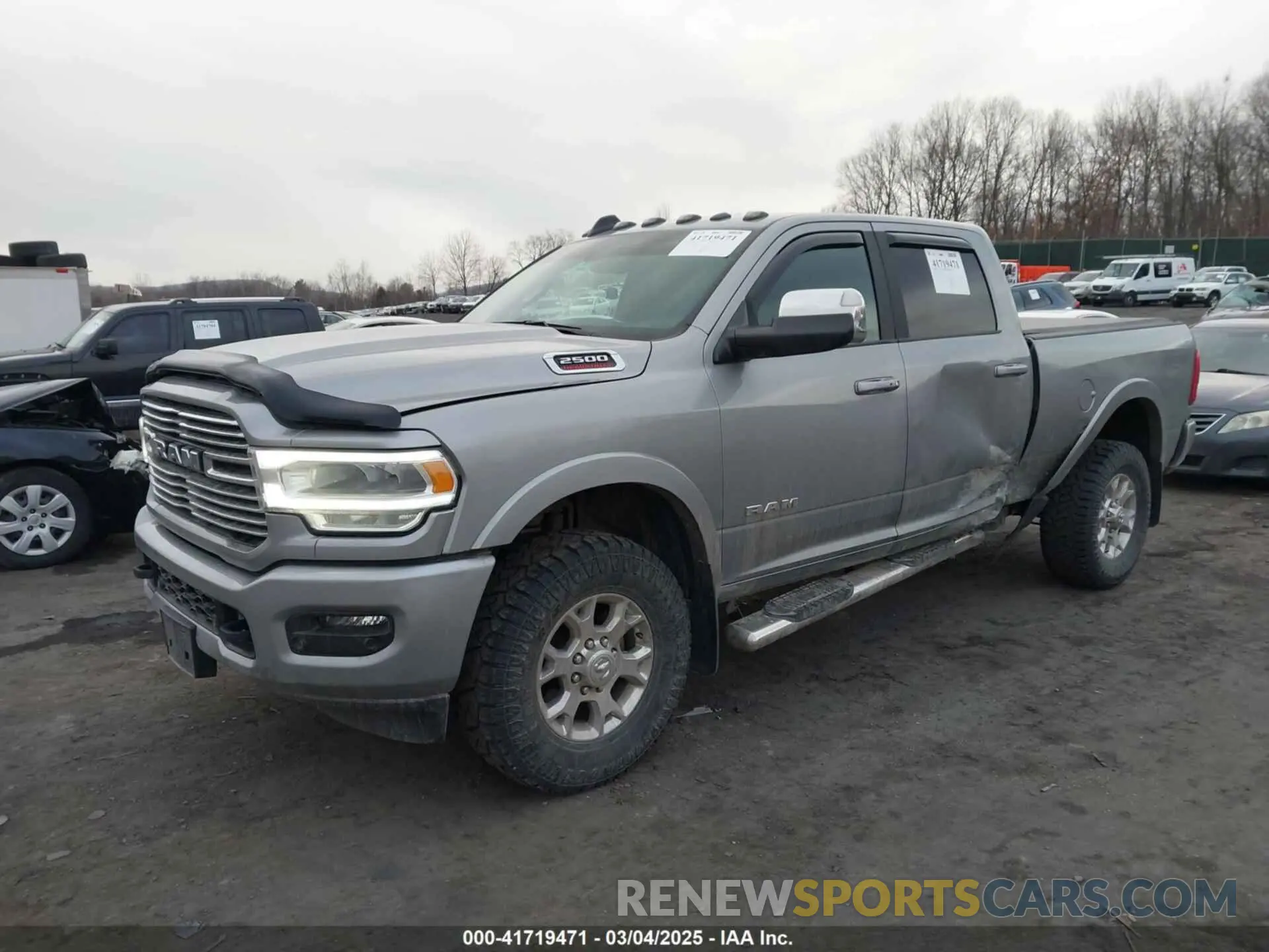 2 Photograph of a damaged car 3C6UR5FJ1NG230435 RAM 2500 2022