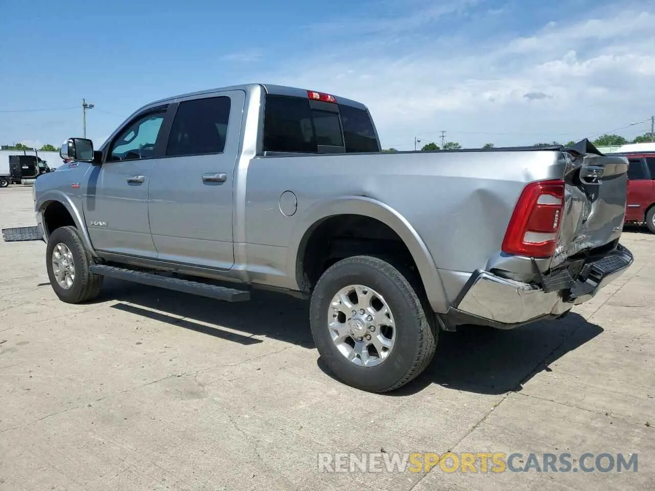2 Photograph of a damaged car 3C6UR5FJ1NG423393 RAM 2500 2022
