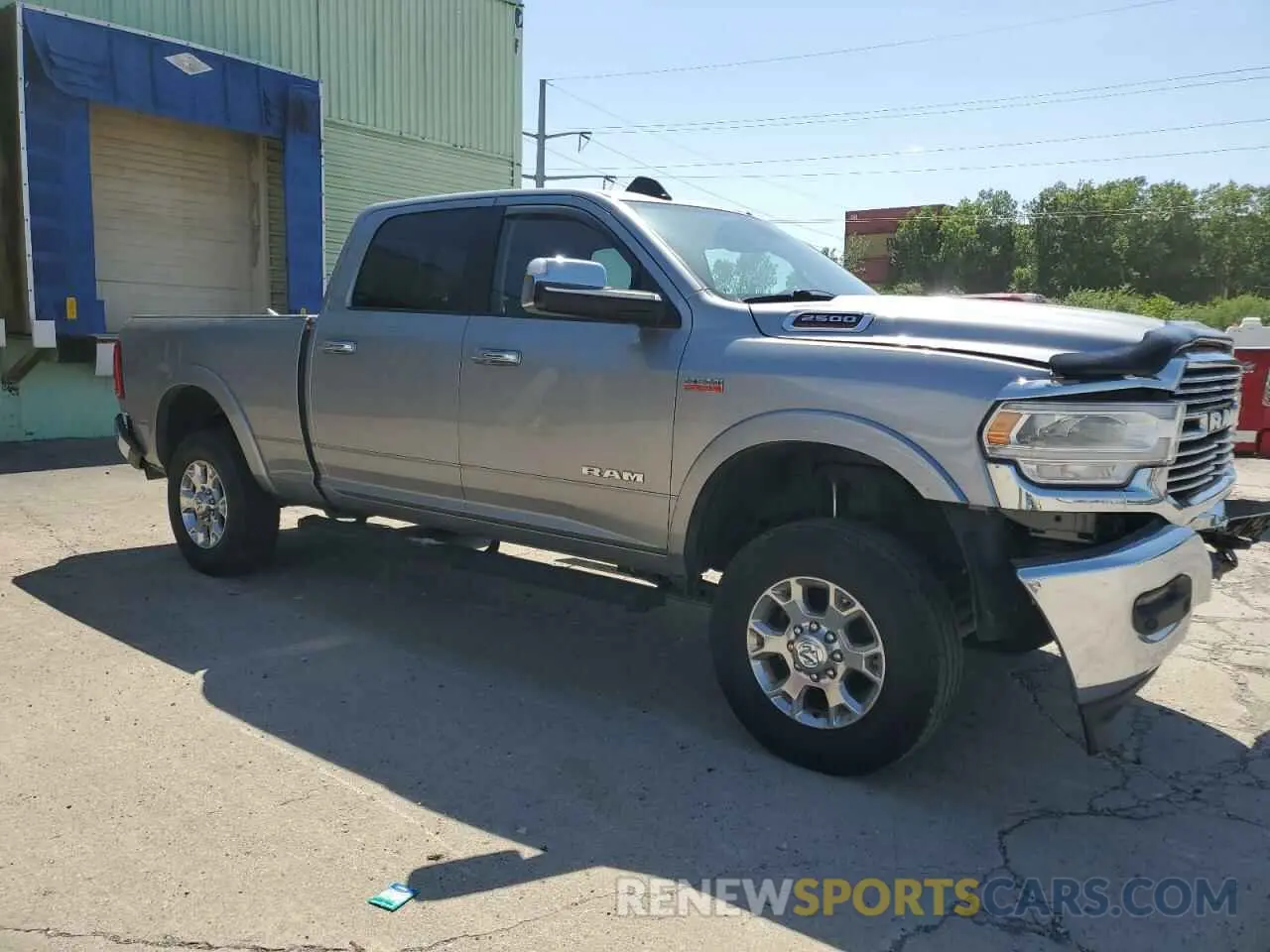 4 Photograph of a damaged car 3C6UR5FJ1NG423393 RAM 2500 2022
