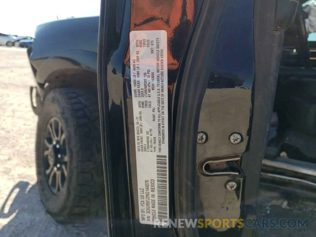 14 Photograph of a damaged car 3C6UR5FJ2NG144079 RAM 2500 2022