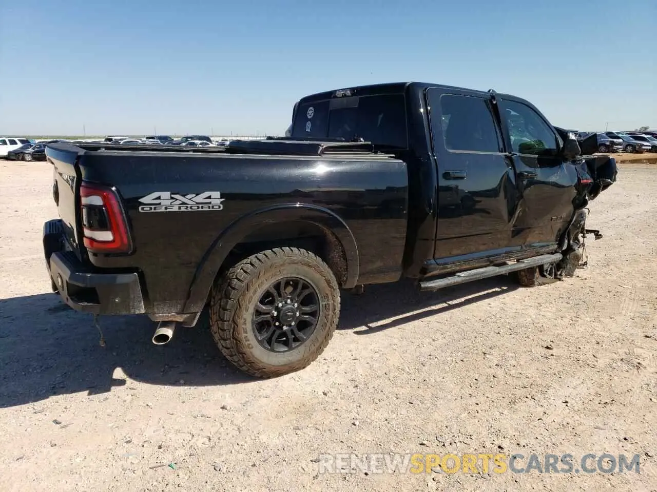 3 Photograph of a damaged car 3C6UR5FJ2NG144079 RAM 2500 2022