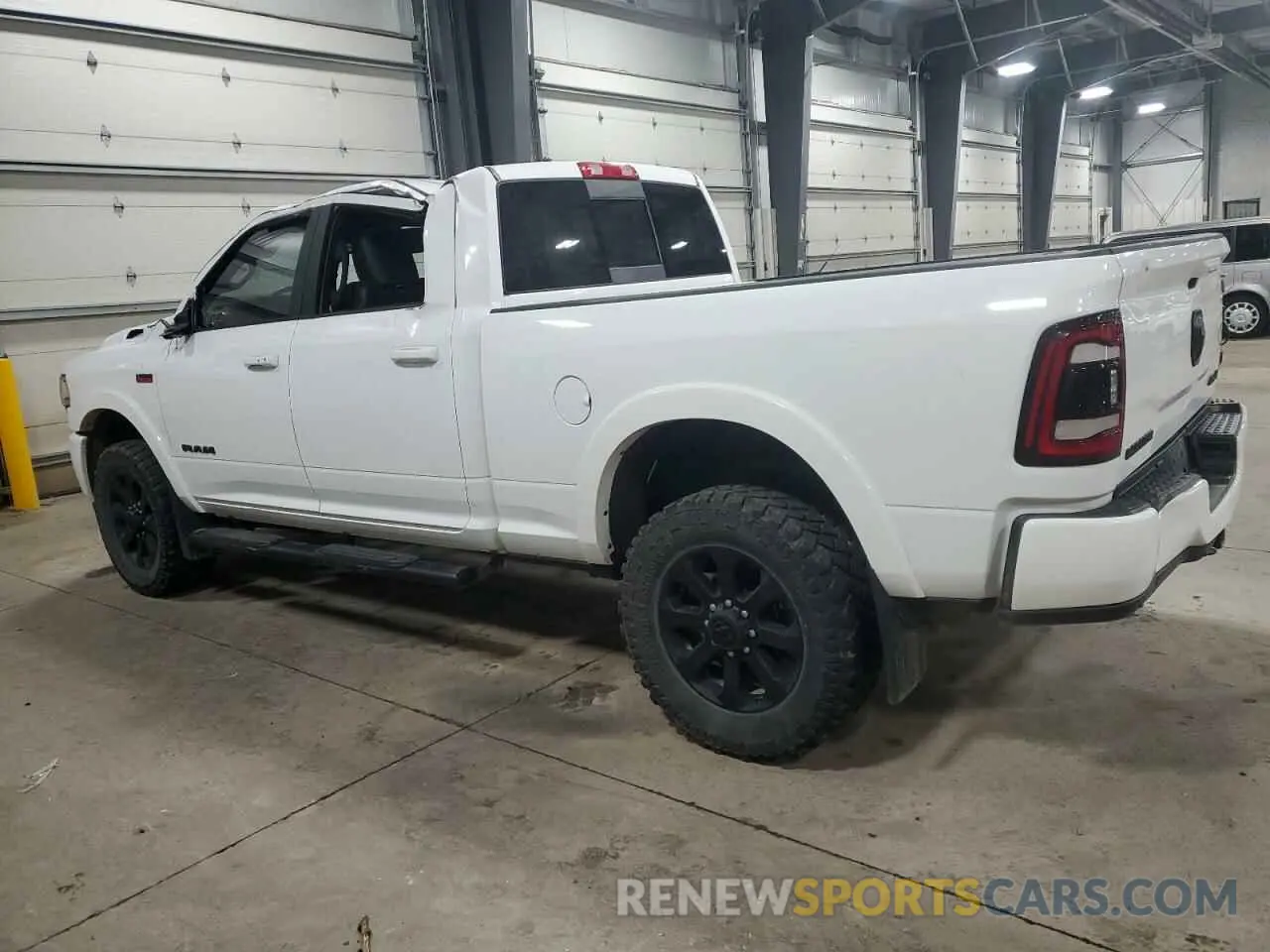 2 Photograph of a damaged car 3C6UR5FJ6NG229426 RAM 2500 2022