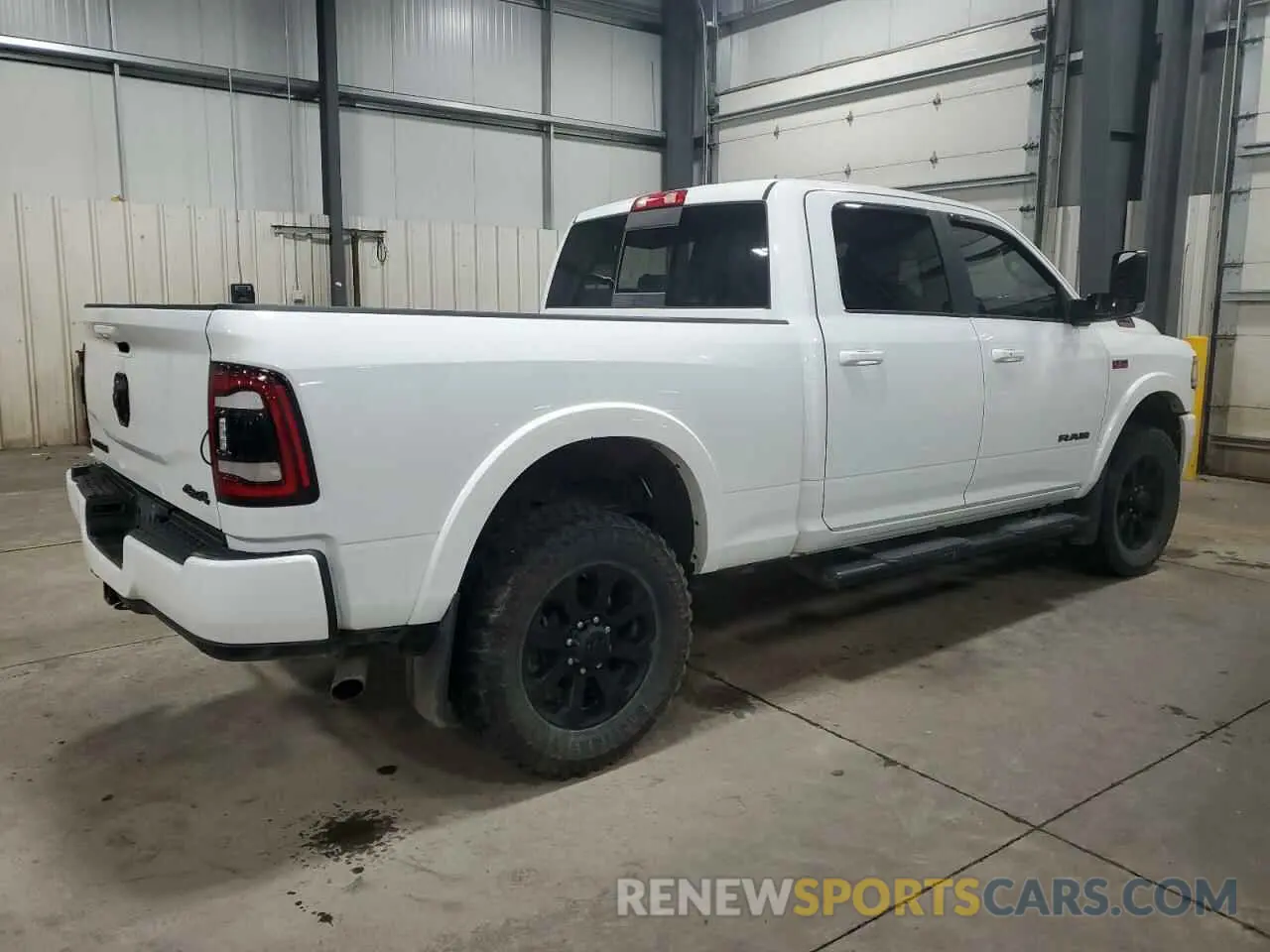 3 Photograph of a damaged car 3C6UR5FJ6NG229426 RAM 2500 2022