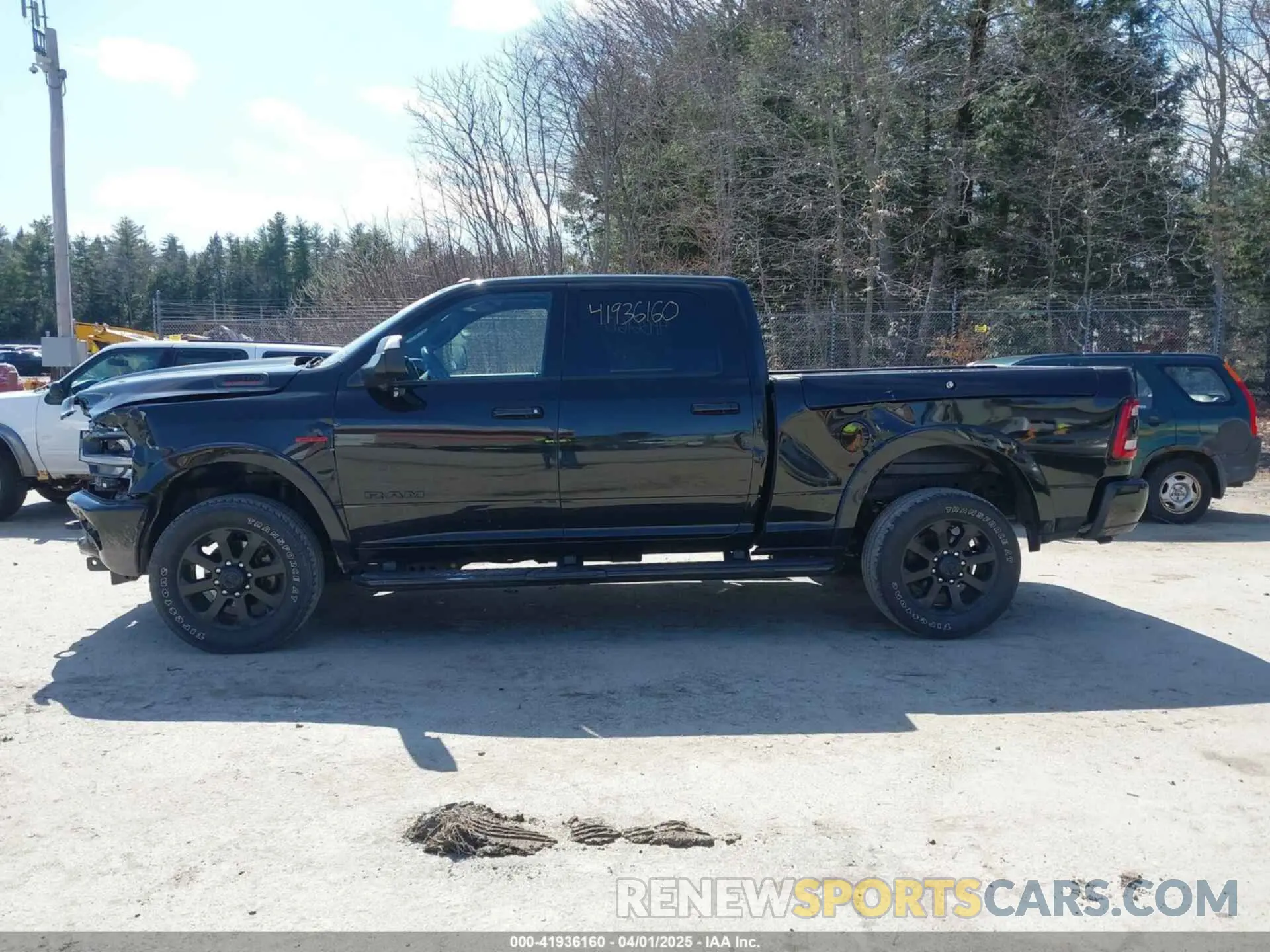 14 Photograph of a damaged car 3C6UR5FL0NG104956 RAM 2500 2022