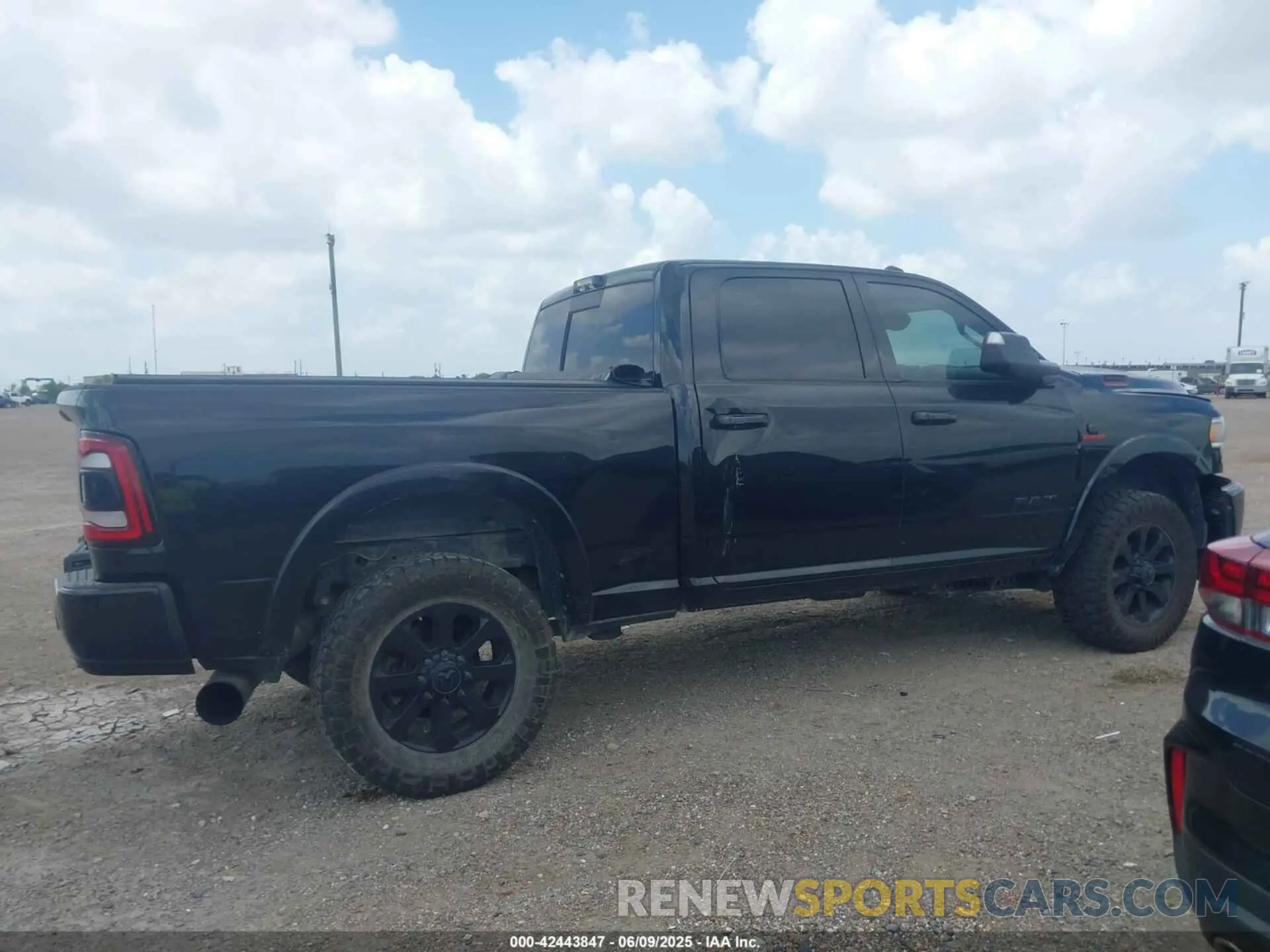 13 Photograph of a damaged car 3C6UR5FL1NG230307 RAM 2500 2022