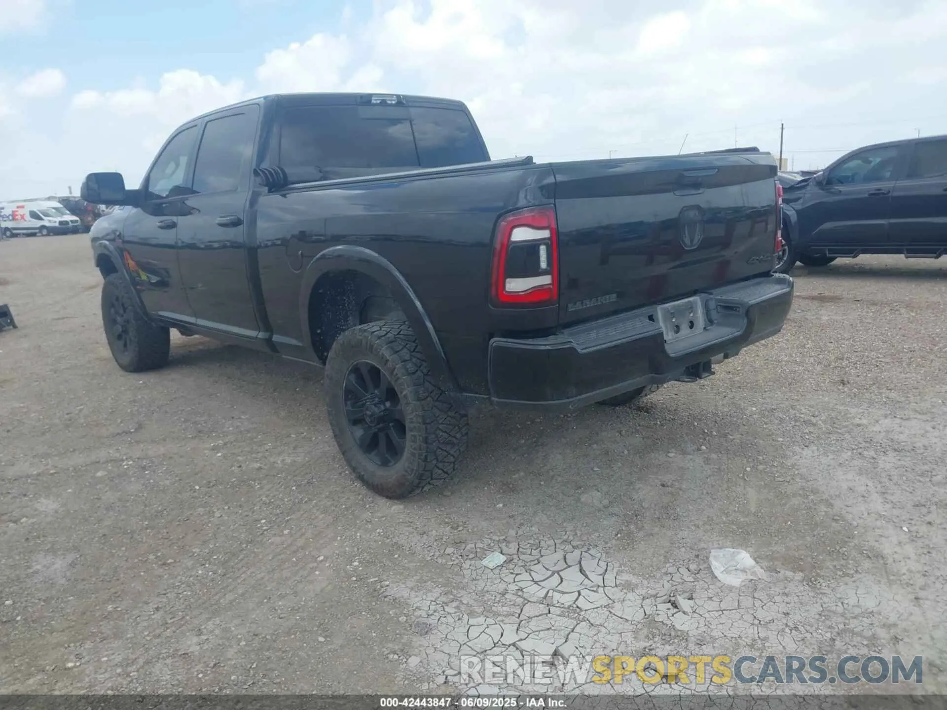 3 Photograph of a damaged car 3C6UR5FL1NG230307 RAM 2500 2022