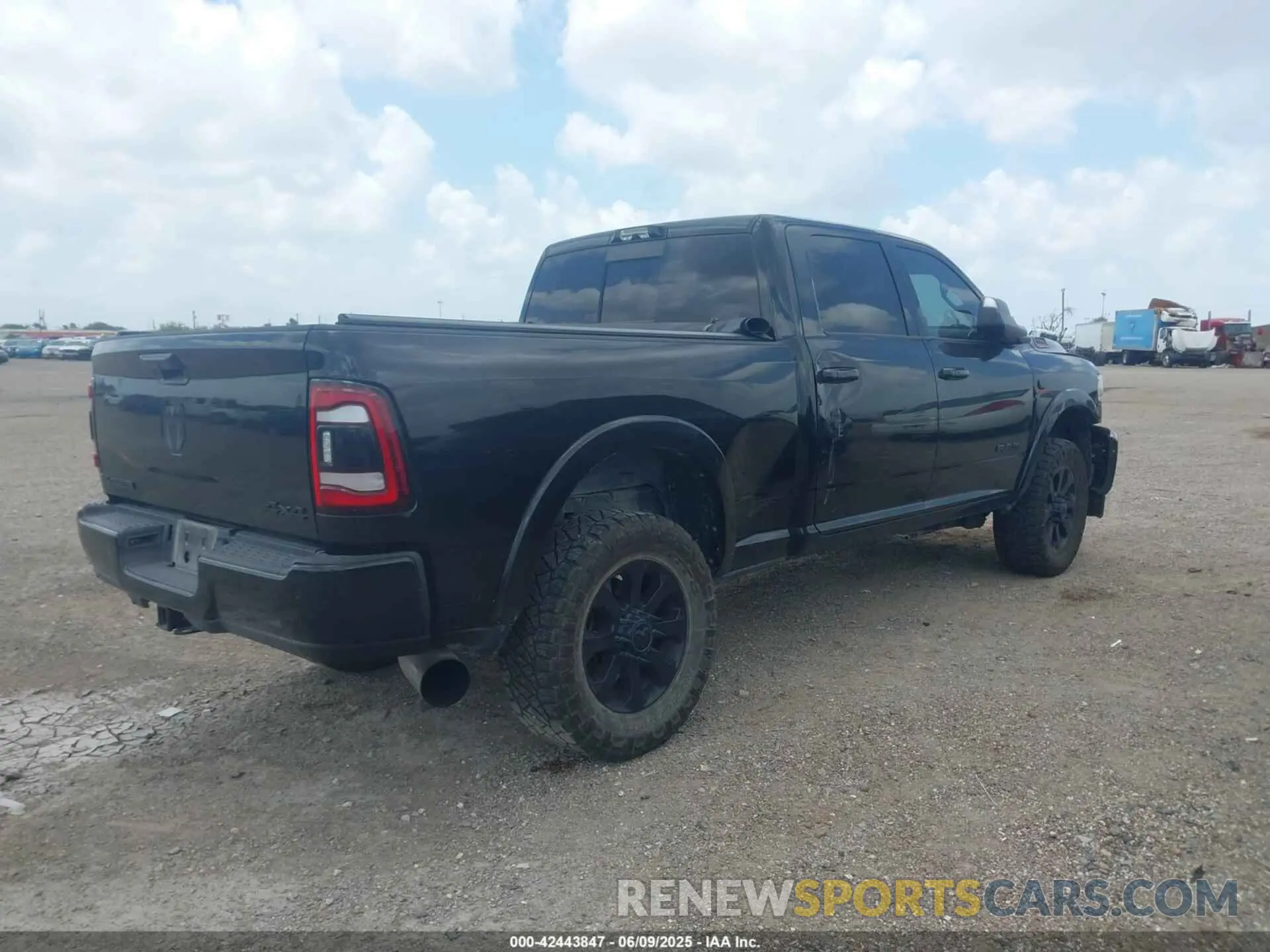 4 Photograph of a damaged car 3C6UR5FL1NG230307 RAM 2500 2022